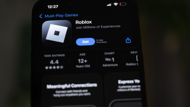 Company logos displayed on smartphone, Poland - 03 Mar 2025